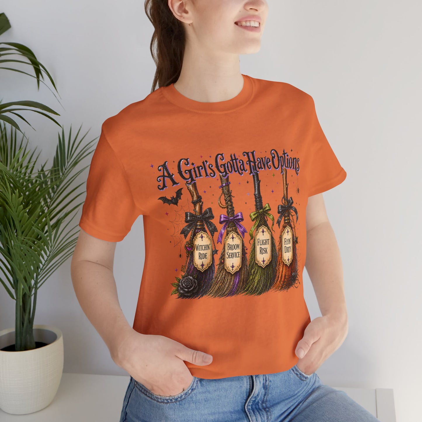 A Girl’s Gotta Have Options Witch Broom Halloween Tee