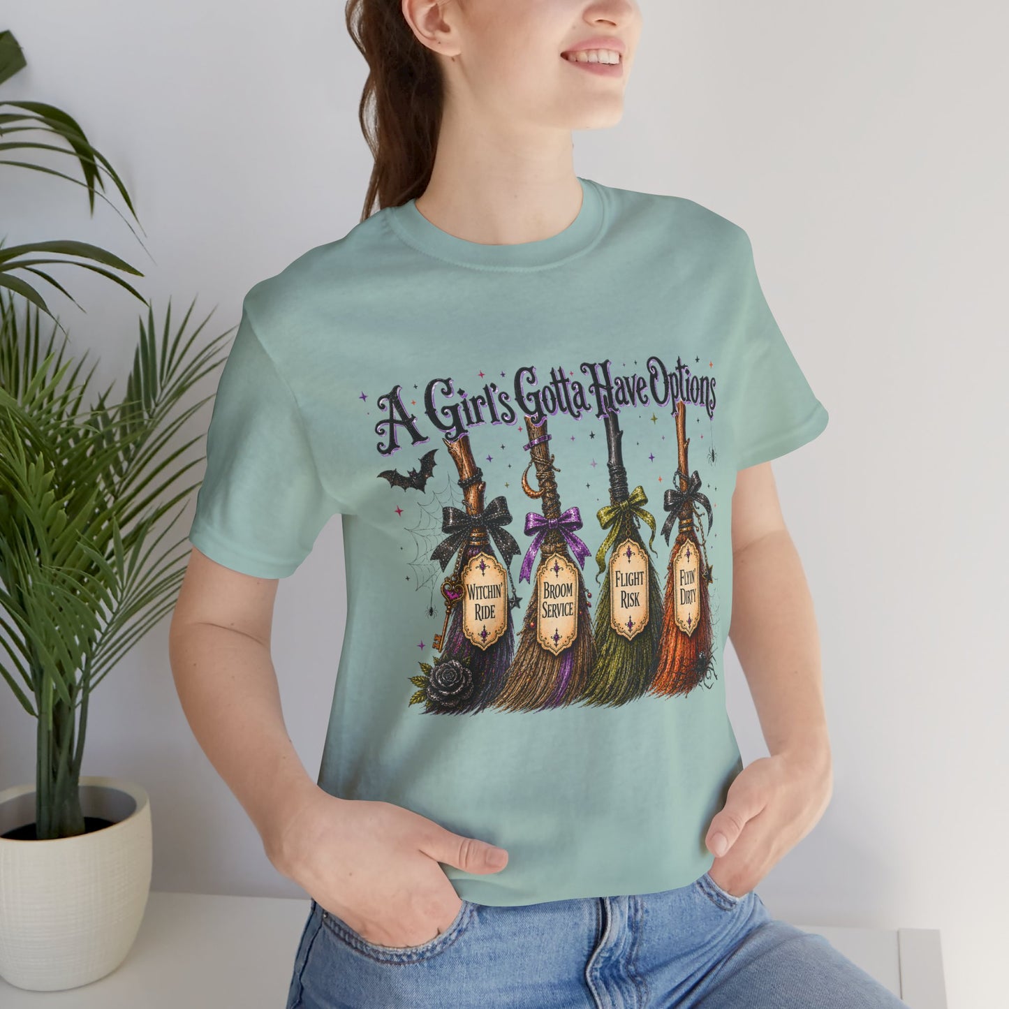 A Girl’s Gotta Have Options Witch Broom Halloween Tee