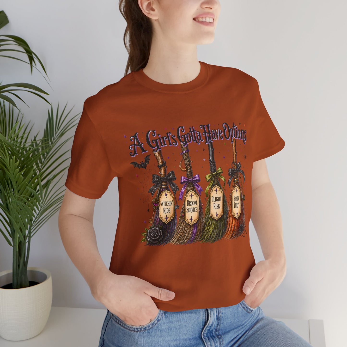 A Girl’s Gotta Have Options Witch Broom Halloween Tee